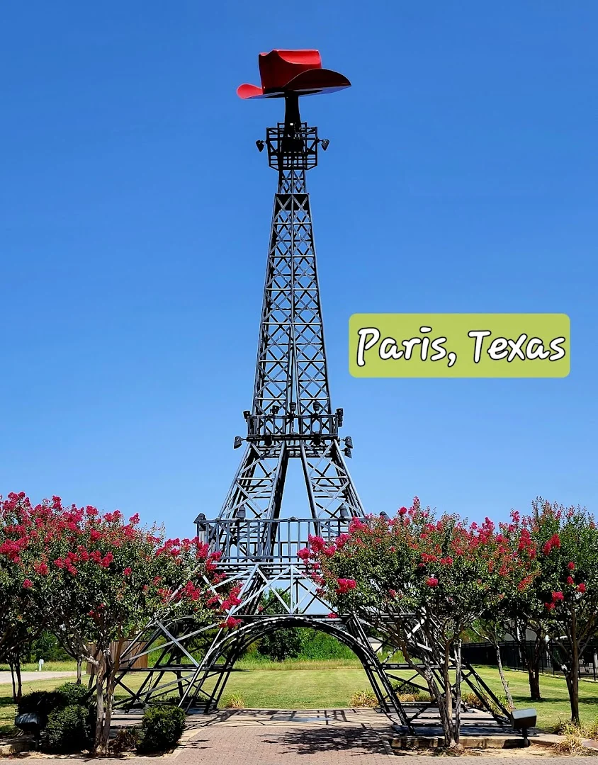 Eiffel Tower Paris Texas with cowboy hat against blue sky